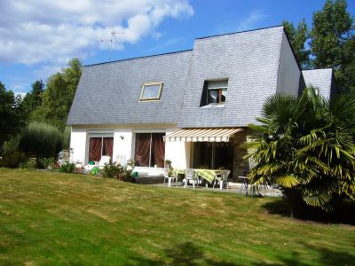 Maison sur parc arbore
