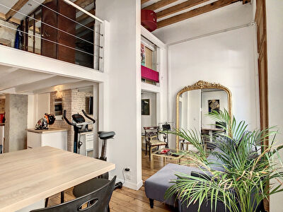 Duplex de 63m2 dans immeuble haussmanien a proximite immediate des quais du Rhone