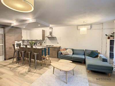 Rez-de-jardin 3 pieces 72 m2 avec un box en sous sol et 2 places de parking