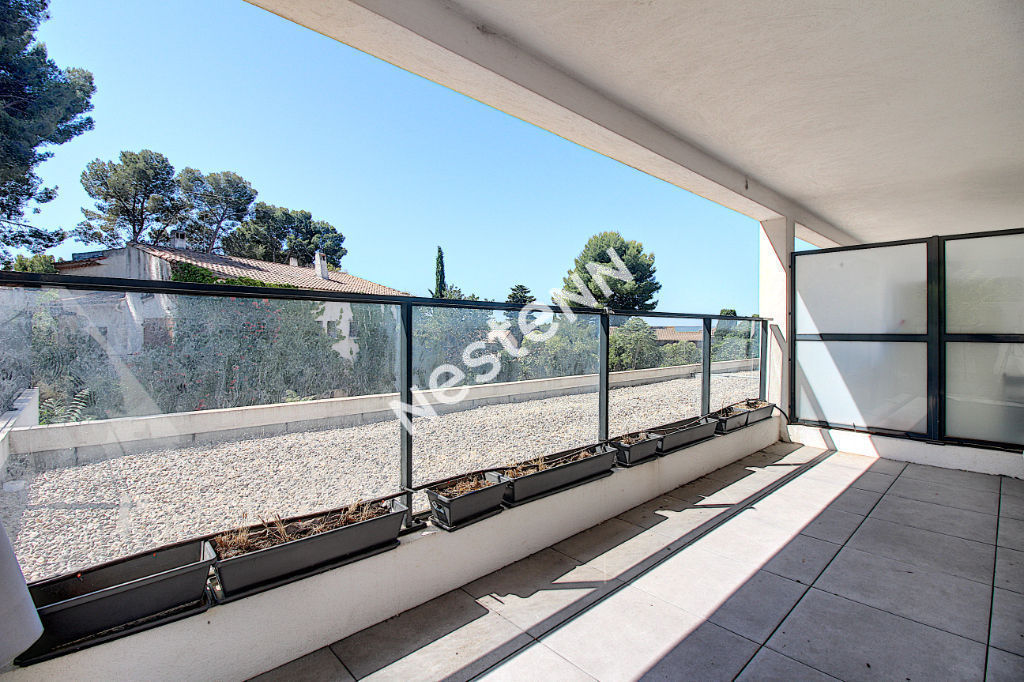 photos n°1 Appartement T2 45 m² avec terrasse de 14 m² + place de parking en sous sol